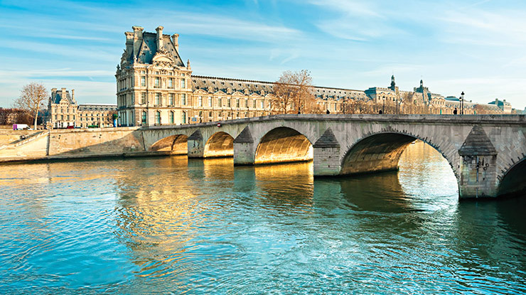 A sunny day in Paris, on the banks of the Seine — where students with a major in French may visit on education abroad.