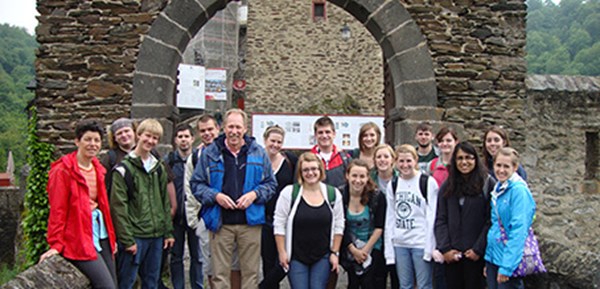 An study abroad group poses for a picture in front of Eltz Castle in Wierschem, Germany.